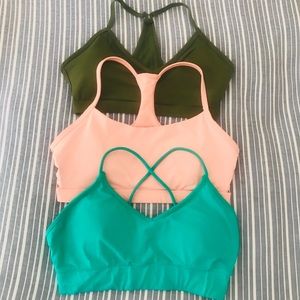 Bundle of three Fabletics sports bras. (S & XS)